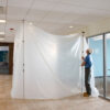 ZipWall 12 dust barrier poles in-use commercial