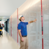 ZipWall 20 dust barrier poles in-use commercial