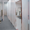 ZipWall 20 dust barrier poles in-use commercial